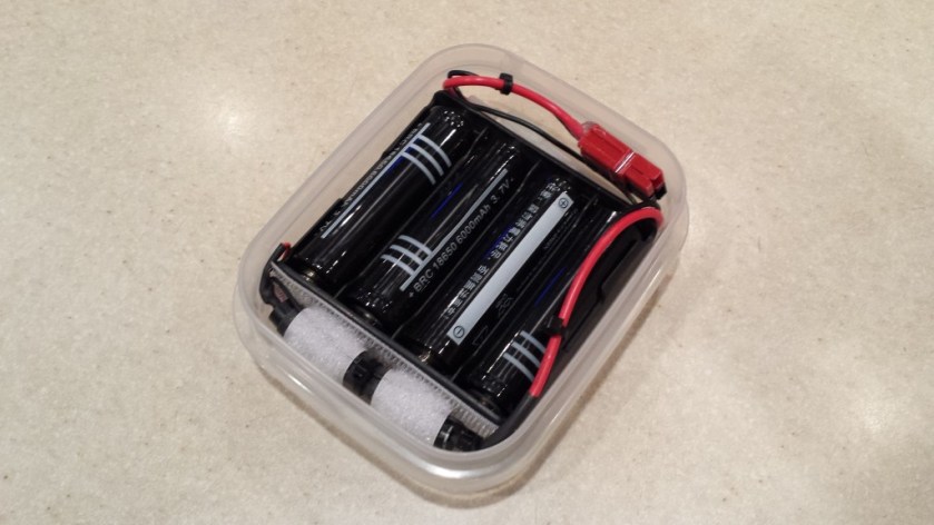 Battery pack with cable stowed