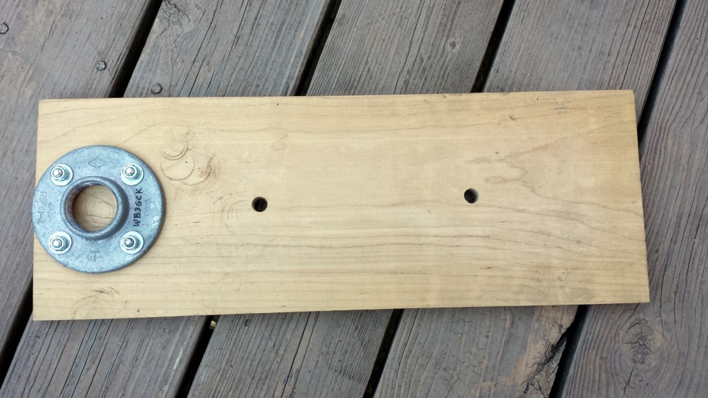 Figure 2. Here is the floor flange mounted on the board.