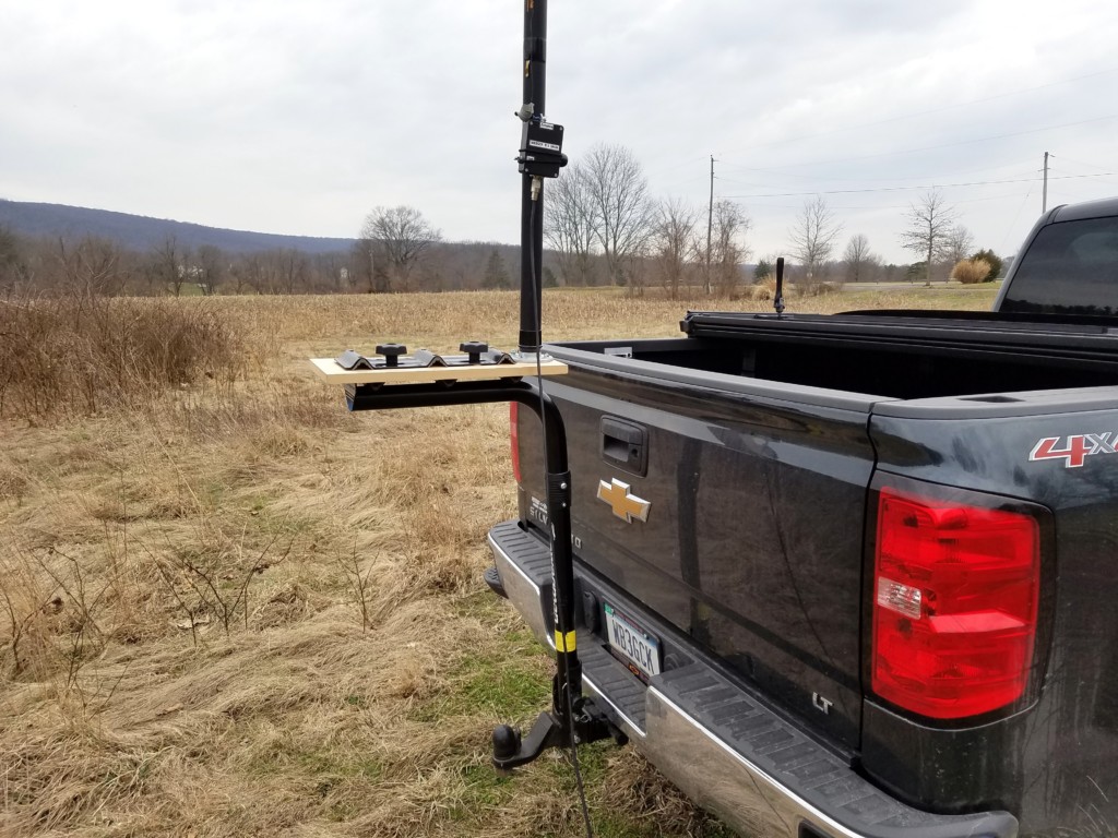 Bike Rack Antenna Mount. A 9:1 unun is attached to the Jackite pole with a bungee cord.