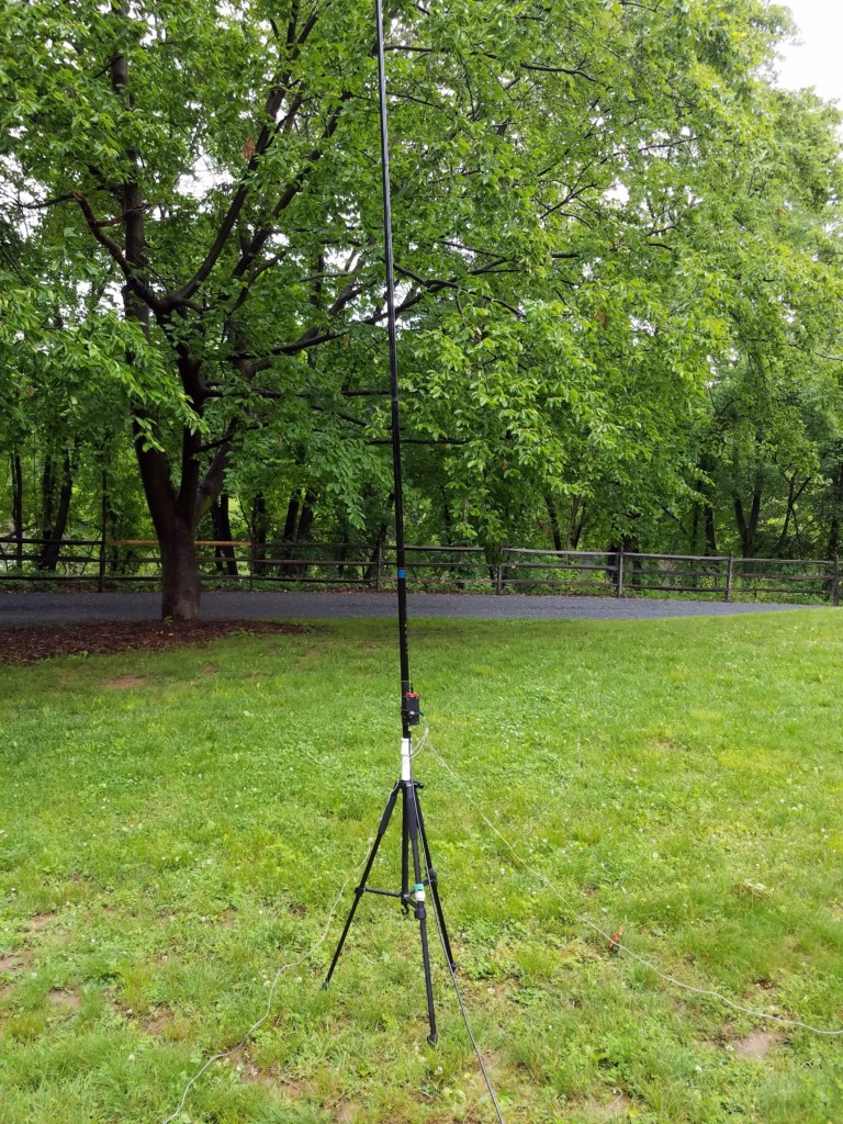 The antenna I was testing. The white piece between the telescopic pole and the tripod is an adapter I made from PVC pipe.
