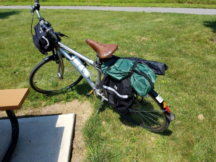 My bike loaded up and ready for travel. The AlexLoop structural components are in the green back. The coax radiator is in one of the pannier bags.