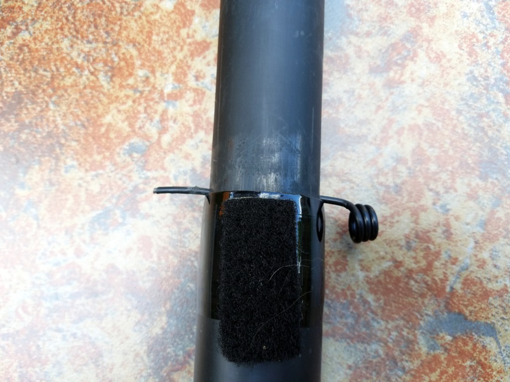 These are the two pole sections with the locking pin inserted.