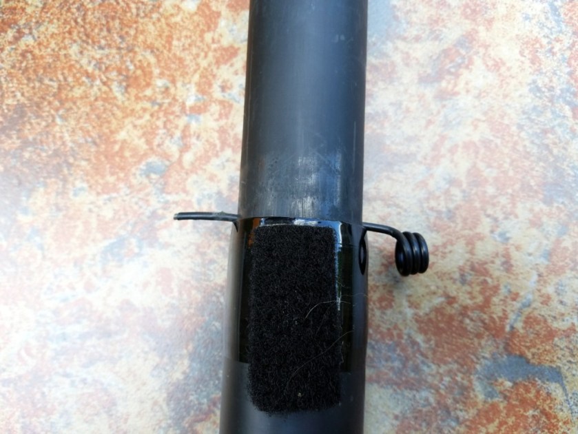 These are the two pole sections with the locking pin inserted.