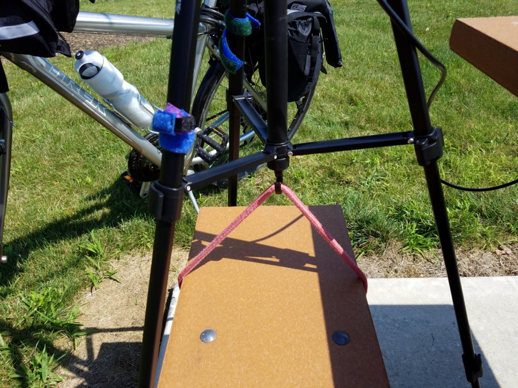 Due to some gusting winds, I used a bungee cord to secure the tripod to the bench.