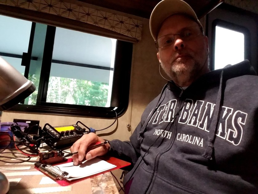 WB3GCK making some straight key contacts from the trailer.