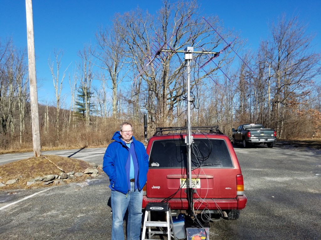 Glen NK1N ready to work the "birds" at High Point State Park. My truck with my vertical is in the background.