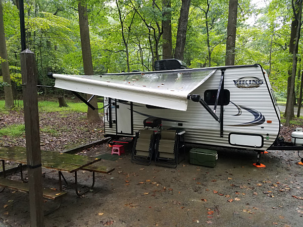 The WB3GCK camper on a rainy morning in Elk Neck State Park in Maryland. My Jackite pole is strapped to the lantern post on the left.
