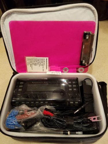 This is the lunch box with the KX3 and accessories packed up. Out of sheer paranoia, I normally wrap the KX3 in a layer of bubble wrap for extra protection. When placed on top of everything, the clipboard provides another rigid surface for even more protection.