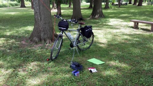 Once again, I pressed my bike into service as an antenna support. One handlebar grip has a 4:1 unun attached to it. The other grip is where I tied off the line used to hoist the antenna.