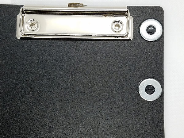 I used GOOP to attach the steel washers to the clipboards I use in the field. The washers are used to attach the magnet bases of my portable paddles and straight key.