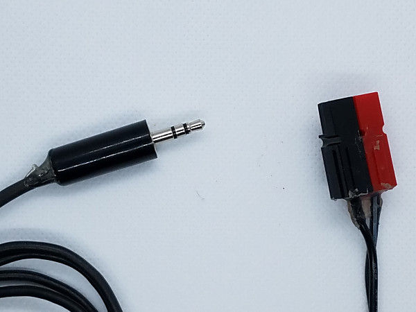 A 3.5mm plug and Anderson Powerpole connector after I have applied GOOP as a strain relief. Sure, they look a bit ugly but these connectors are pretty much bomb-proof. These items have seen heavy use in the field over the past 3 or 4 years.