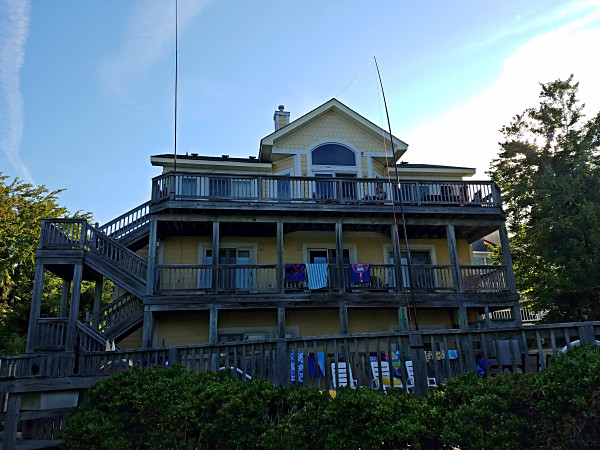 Poles supporting my "Up & Outer" antenna. The pole on the left is supporting the vertical wire. The pole on the right is the end support for the horizontal wire.