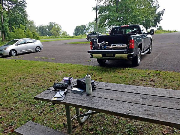 My set up in Valley Forge Park for the 2019 Skeeter Hunt. The table was well-shaded and close enough to the truck for 18-feet of coax to reach the antenna.