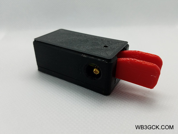 Unbranded, 3D-printed paddles from eBay. The screw (one on each side) adjusts the paddle contact spacing.