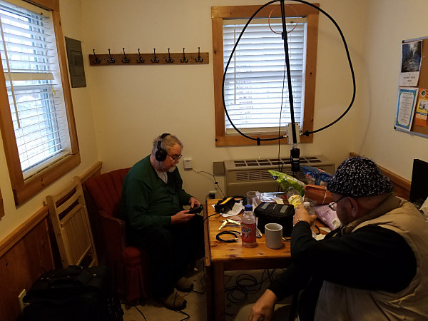 Ed K3YTR (L) trying his loop antenna inside the cabin with Ed K3BVQ observing