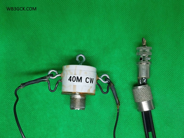 My version of the WA3WSJ AT Dipole. The discoloration on the PVC end cap is from a mishap I had while potting it with epoxy. On the right is a PL-259 connector used with 300-ohm ladder line. As you can probably tell, this antenna has seen years of heavy use.