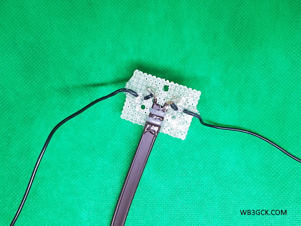 This is the center connector for my 66-foot doublet. The feedline is the old, cheap TV twin-lead.