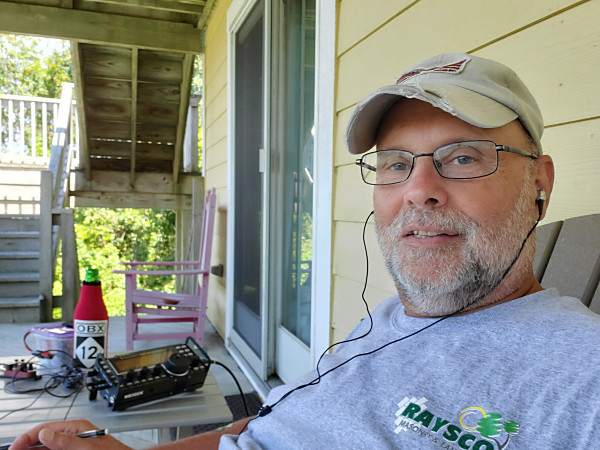 WB3GCK operating in Corolla, NC, on the Outer Banks (with a cold "807" on the table)