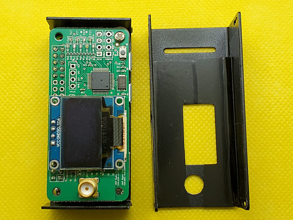 My disassembled hotspot. If you look closely, you can see the electrical tape I added inside the top cover.