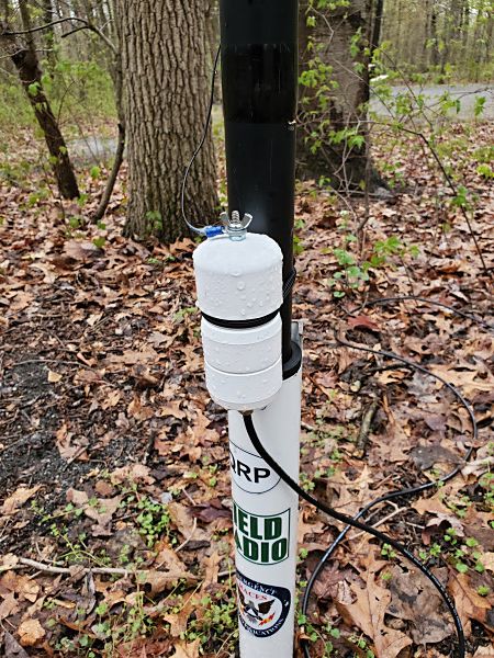 My weather-resistant 9:1 UnUn after 6 or 7 hours of steady rain. It came through unscathed.