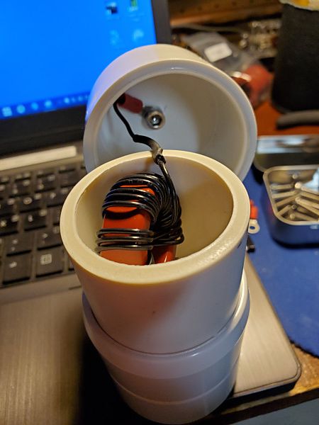 This is a view of the toroid. Before I closed it up, I wedged pieces of packing foam on either side of the toroid to hold it in place.