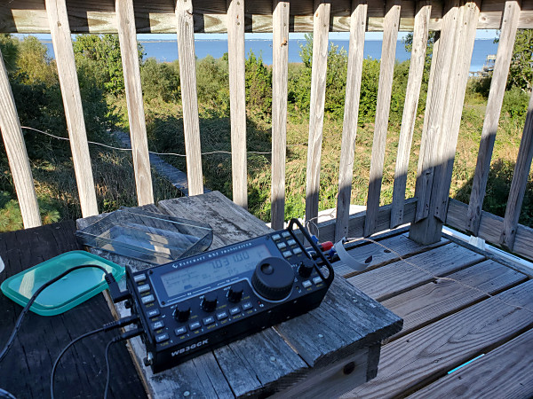 My KX3 out on the deck. You can see the two pieces of speaker I used for an antenna.