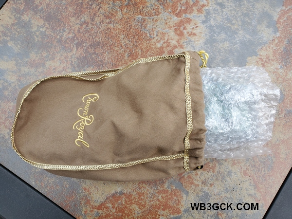 The bubble-wrapped TR-35 going in the bag