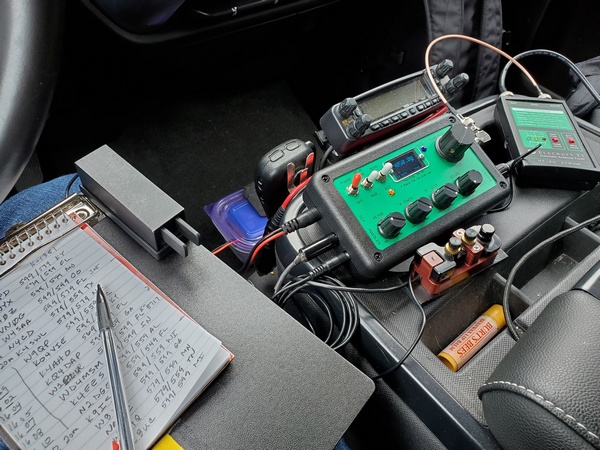 The organized chaos in the cab of my truck, which includes my PennTek TR-35 and Elecraft T1 ATU.