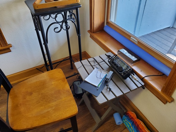 My operating position. A piece of foam "pool noodle" was used to seal the window where the coax enters.