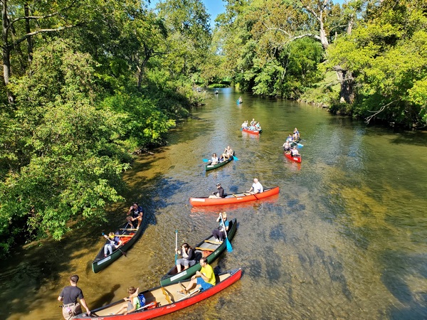 Canoeists waiting to exit their canoes