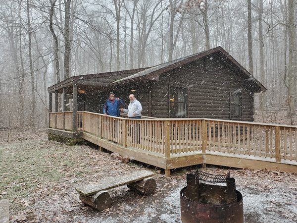 NU3E (left) and NK1N outside the cabin during a snow squall