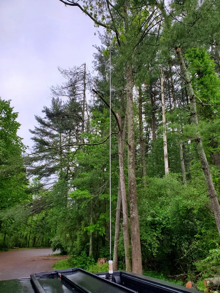 The MFJ-1979 17-foot whip mounted on my "Junk Box Coil."