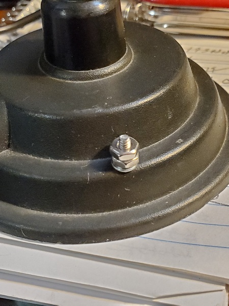 Exterior view of the old magnetic mount. I later removed the second nut from the screw I installed.