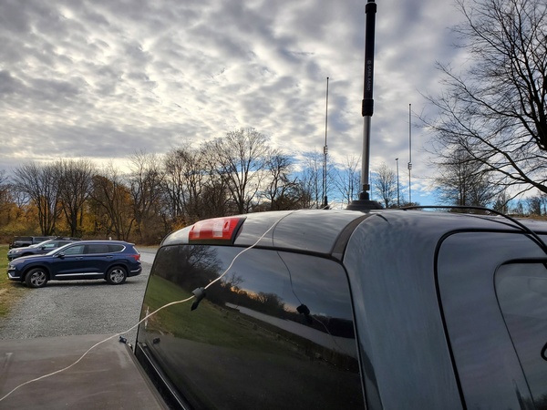 The Gabil GRA-7350TC and magnetic mount with one 33-foot counterpoise attached. The wire dropped to the ground behind the truck and wrapped around the side.