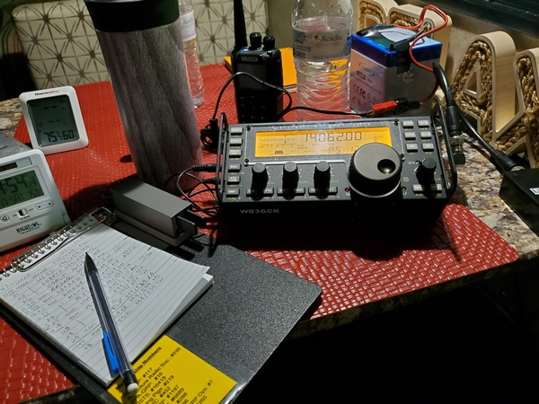 My KX3 setup inside the little camper. The coax is fed through a window to the right of the radio.