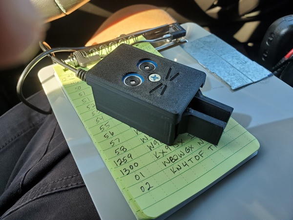 The CWMouse paddles. For size reference, they are on a 3"x5" notepad.