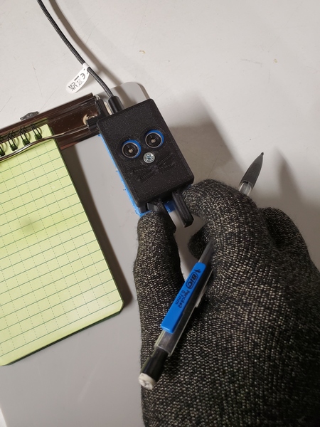This is how I normally send while holding a pencil. These touchscreen gloves allow me to do that with no problems.