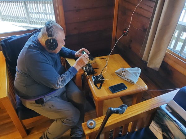 Ed K3BVQ operating from the cabin with his indoor loop antenna