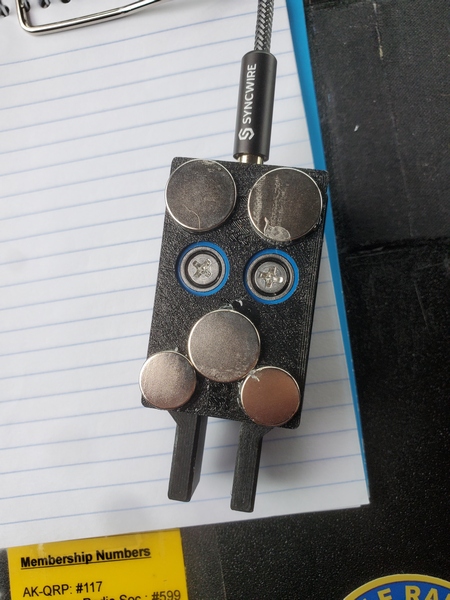 The assortment of magnets I glued to the bottom of my CWMouse paddles