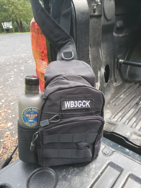 My Dollar Sling Pack. The callsign patch and water bottle were added by me. Actually, the callsign patch cost a lot more than the sling pack.