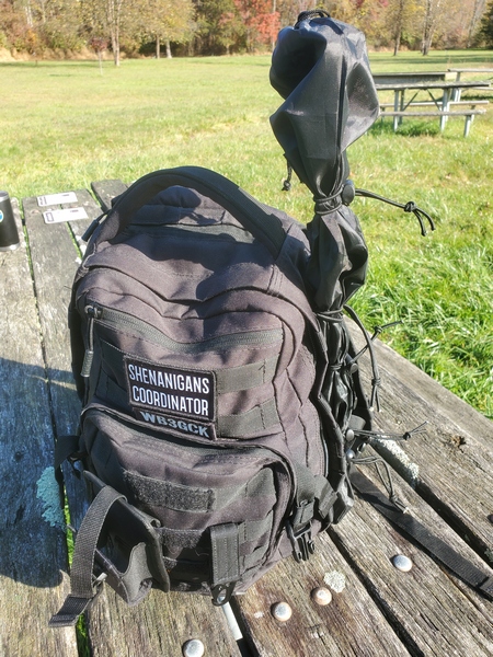 I've been carrying my Gabil GRA-CFP2600 carbon fiber whip sections strapped to my backpack. It doesn't look like much, but it's functional.